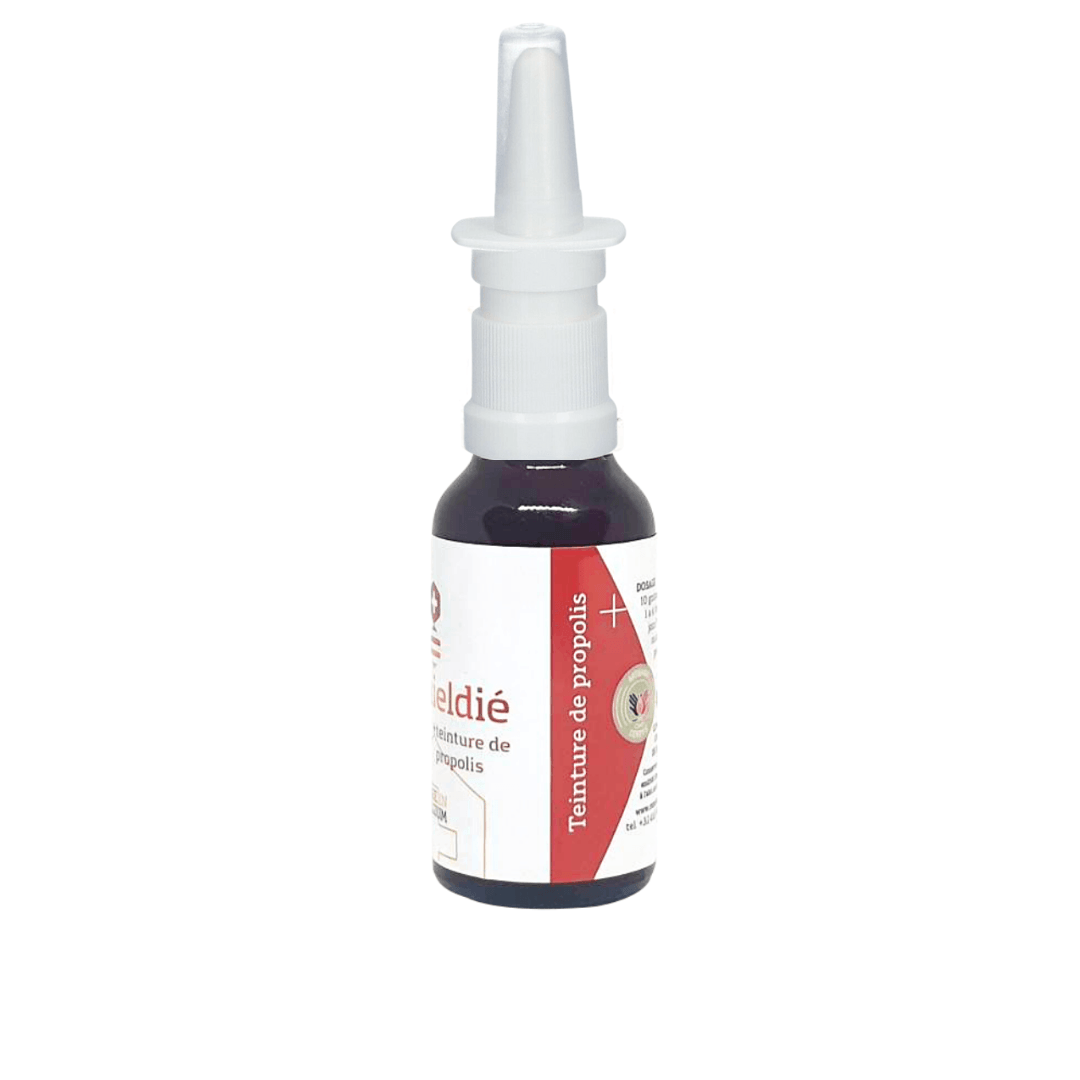 Flacon de spray nasal à la propolis avec un embout pratique, présenté sur un fond blanc minimaliste pour souligner la pureté et la fonctionnalité du produit.